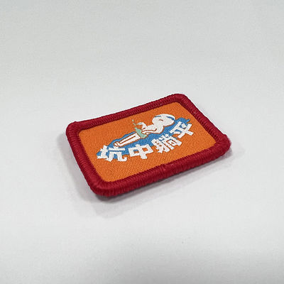 Hierro de encargo de Emoji en remiendo del bordado de la frontera de Jean Patches Woven Label Patches Merrow