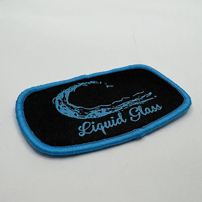 Marca de encargo Logo Patches Iron On Patches con la frontera azul de Merrowed