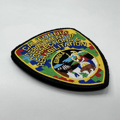 La aduana colorea al gobierno que las insignias uniformes del bordado cosen en remiendos tejidos