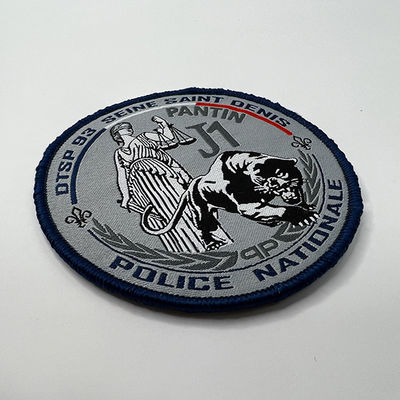La insignia bordada Overlock de alta densidad remienda el diámetro de 30m m auto-adhesivo