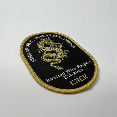 Frontera adhesiva modificada para requisitos particulares de Dragon Embroidery Patches Shrink Proof Merrow del derretimiento