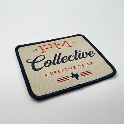 Logo Iron On Woven Patch de encargo que Emroidery lavable remienda el laser cortó la frontera para la ropa